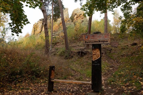 Klusfelsen with colourful autumn leaves, prehistoric cult site in the Harz Mountains, served as a