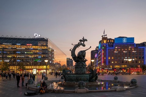 Neon sign, fountain, City Hall Square or Rådhuspladsen in the evening, Hans Christian Andersen's