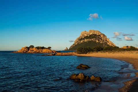 Picturesque beach and island, sunset, Isola di Tavolara, Porto San Paolo, Sardinia, Italy