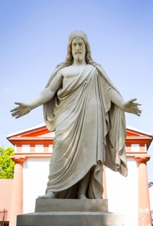 Large figure of Jesus Christ with outstretched arms at the Neschwitz cemetery, Upper Lusatia,