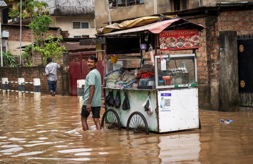 A food stall in a flooded street after heavy rains in Guwahati, India on April 28, 2025