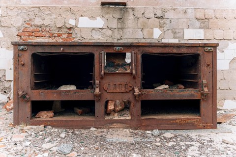 Heavily rusted kitchen stove, abandoned administrative buildings, abandoned Swift factory, The
