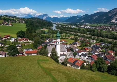 Drone image, view of village with parish church, Breitenbach am Inn, Inntal, Tyrol, Austria