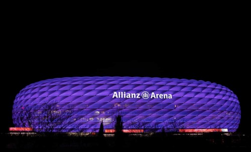 Allianz Arena illuminated violet purple in honour of International Day of People with Disabilities