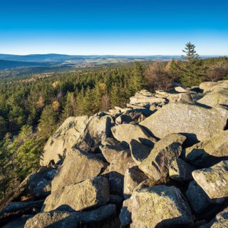 View from the Kösseine over the forests of the Fichtelgebirge, sea of boulders on the summit,