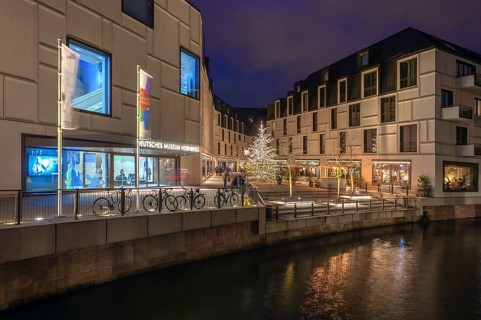 Night view of the Neues Museum Nuremberg, the Museum of the Future on the Pegnitz, Nuremberg,
