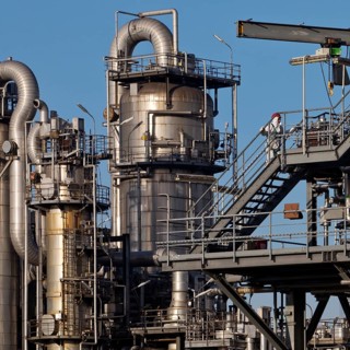 Worker on a line at the Ineos chemical plant, Moers, North Rhine-Westphalia, Germany