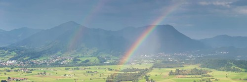 Panorama from the Grünten over the Illertal with rainbow to Blaichach and Immenstadt, behind