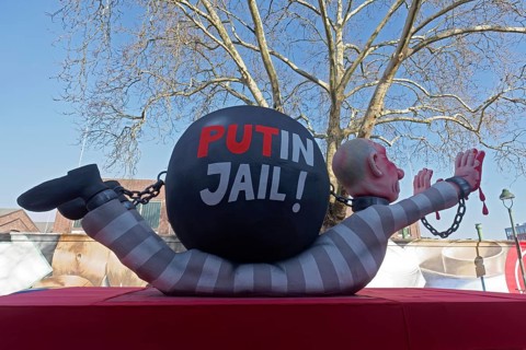 Russian President Vladimir Putin as a convict with blood on his hands, Put In Jail, papier-mâché