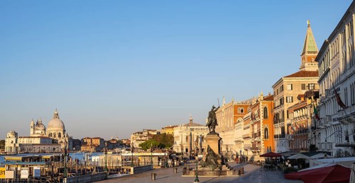 Riva degli Schiavoni promenade with monument to Victor Emmanuel II, Venice, Veneto, Italy