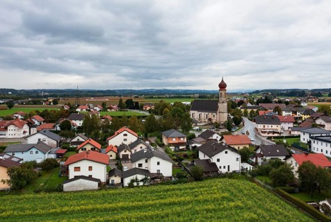 Drone shot, view of village with church, Burgkirchen, Innviertel, Upper Austria, Austria