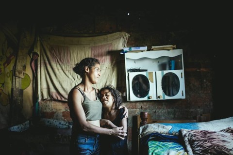 María with one of her four daughters, the eldest joined a criminal gang at 13, Túrgua, Venezuela