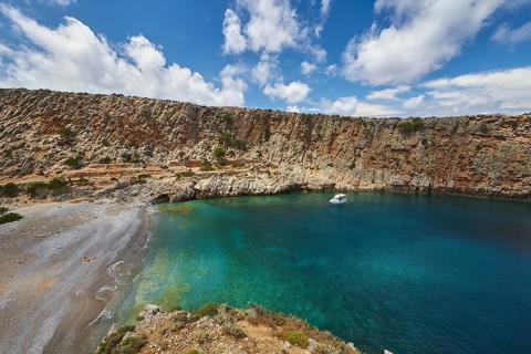 Menies, Rodopou, dream bay, pebble beach, single boat at anchor, crystal clear sea, green sea,