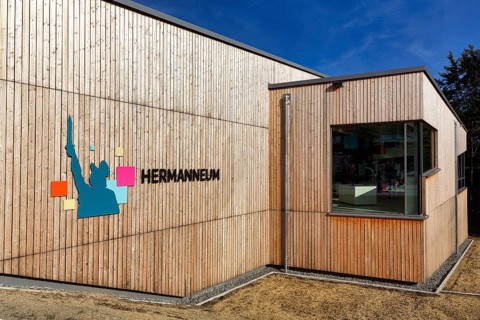 Visitor centre with inscription Hermanneum am Hermannsdenkmal, adventure world, tourist attraction,