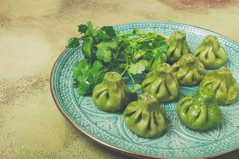 Green khinkali, khinkali with spinach, Georgian cuisine, homemade, no people