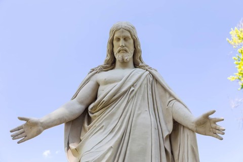 Large figure of Jesus Christ with outstretched arms at the Neschwitz cemetery, Upper Lusatia,