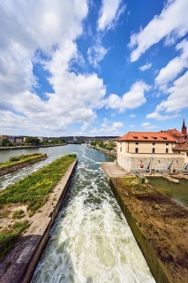 River Main, barrage, general architecture, hilly landscape, forest, total blue sky, cumulus clouds,