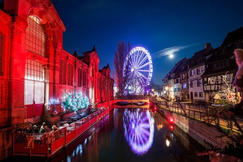 Colourfully illuminated and Christmassy decorated half-timbered houses, old town, blue hour,