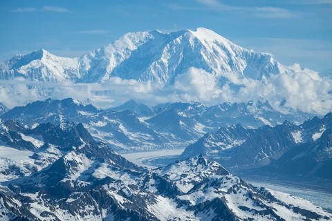Panorama, clouds over high mountains, Mt Denali or Mount McKinley with Kahlitna Glacier, aerial