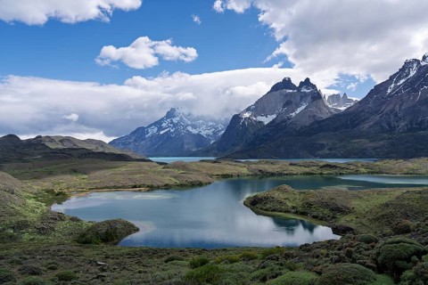 Cuernos del Paine with offshore lagoons and Lake Nordenskjöld, snow-capped granite peaks under