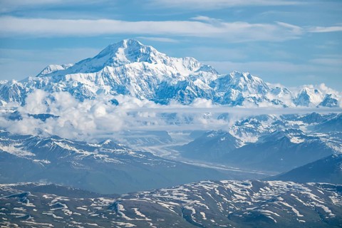 Clouds over high mountains, Mt Denali or Mount McKinley, aerial view, Alaska Range, Denali National