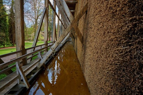 Wooden scaffolding next to a graduation house with adjacent park, spa town of Bad Orb, Spessart