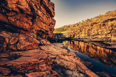 Bell Gorge waterfall, a body of water in north-west Australia in the Kimberley. Sunrise in the