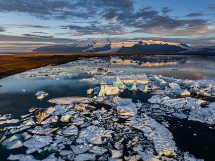 Ice floes, glacier, glacier tongue, fog, clouds, morning mood, mountains, reflection, aerial view,