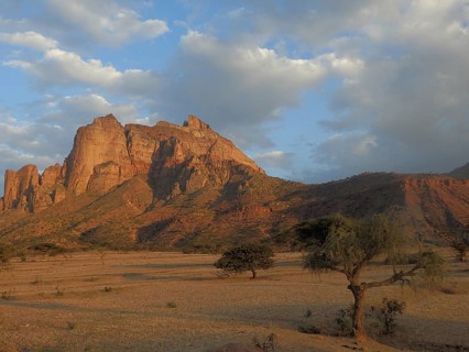 Rock formation near Abuna Yemata Guh rock church, impressive mountain landscape at sunset with