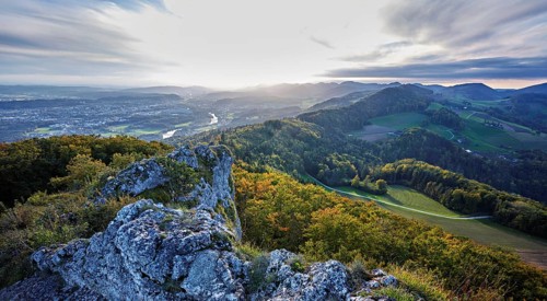 View from the Gisliflue of an autumnal forest with the Jura foothills behind, Talheim, Canton,
