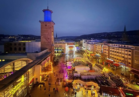 View of the town hall tower with the Christmas market from a Ferris wheel gondola, Hagen, Ruhr