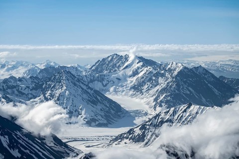 Snow and ice, epic mountains with glaciers, aerial view, Alaska Range, Denali National Park,