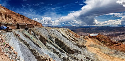 Panoramic view of a rocky mountainside landscape under a wide cloud sky, The silver mines near