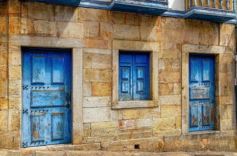 Facade of an old colonial house built with stones in the city of Ouro Preto, Ouro Preto, Minas