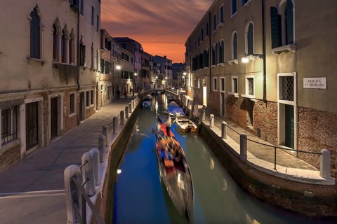 Gondola in the evening in a side canal in the Dorsoduro district, Venice, Veneto, Italy