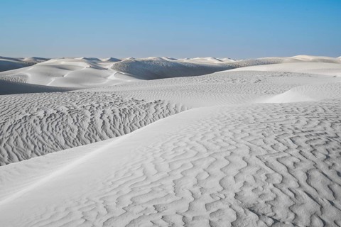 White sand dunes in the Khaluf Desert, Oman