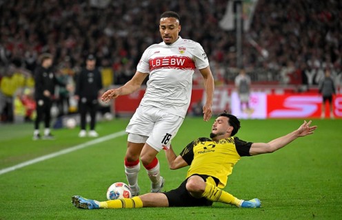 One-on-one, action Jamie Leweling VfB Stuttgart (18) against Ramy Bensebaini Borussia Dortmund BVB