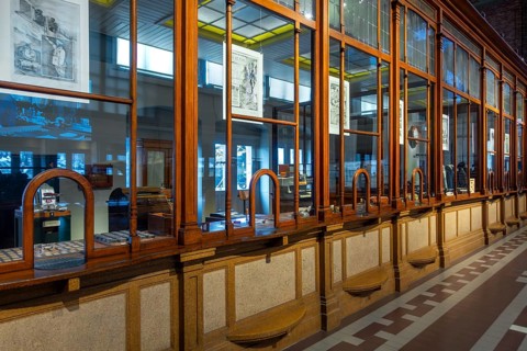 Former ticket hall with ticket counters and offices of the Schaerbeek railway station at Train