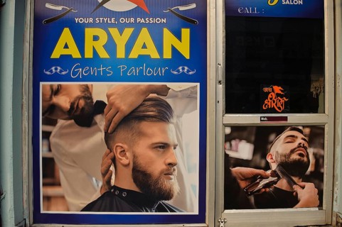 Aryan gents parlour, poster at the entrance of a gents parlour named Aryan, Chhattisgarh, India. In