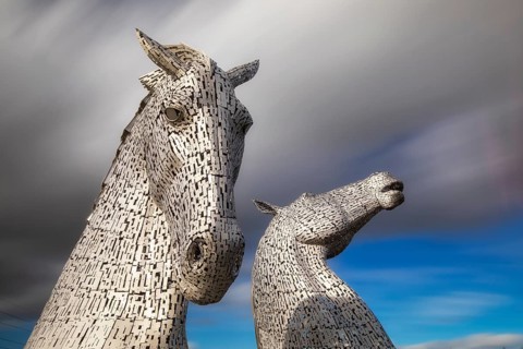 The Kelpies are two giant steel horse heads, each nearly 100 feet (30 metres) tall, located over
