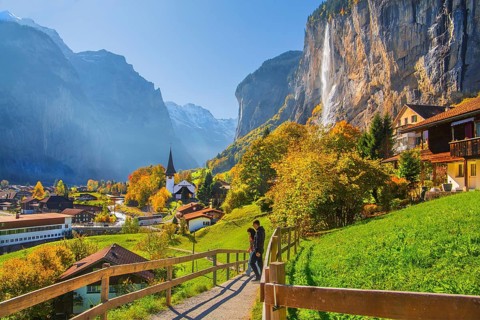 View of town and valley with Staubbach waterfall in autumn, Lauterbrunnen, Bernese Oberland, Canton