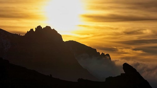 Mystical silhouette of a mountain in front of a dramatic sunset, Teide National Park, Teide