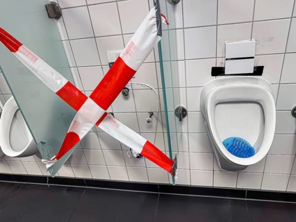 Broken urinal in an inn. Rottweil, Baden-Württemberg, Germany