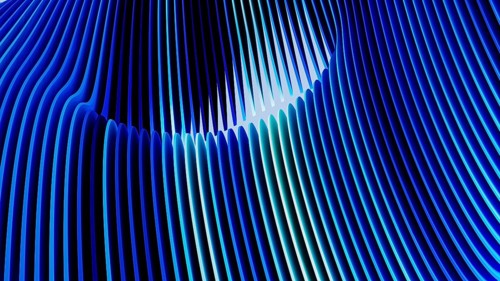 Colorful, flowing lines form a captivating abstract background, showcasing dynamic geometric shapes