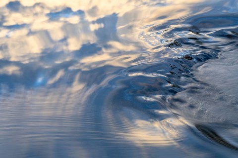 Cloud reflection in a stream, abstract, Norrbotten, Lapland, Sweden, August 2022