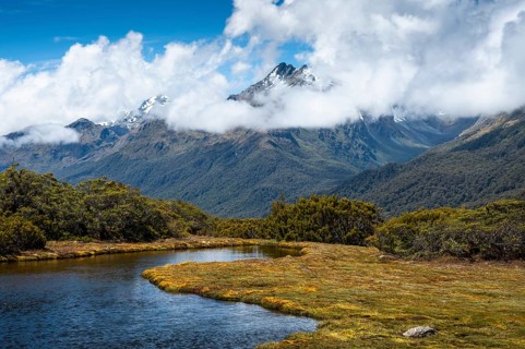 Mountain landscape with lake on the Key Summit Track hiking trail. Fiordland National Park,