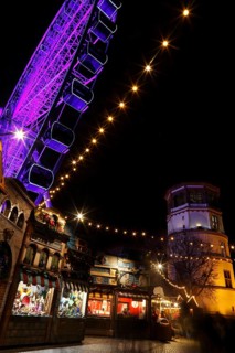Christmas market with a ferris wheel on Burgplatz square, historic town centre, Dusseldorf, North