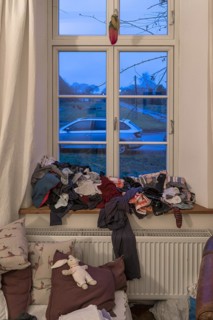 Unironed laundry on the windowsill in the living room, Mecklenburg-Vorpommern, Germany