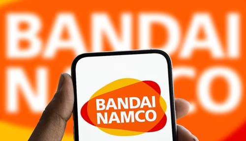 Bandai Namco logo is displayed on smartphone. Bandai Namco Entertainment Inc is a Japanese