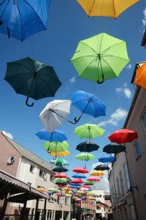 Many umbrellas hang over the street in Vejle, Jutland, Denmark, Scandinavia